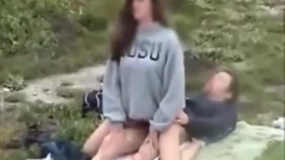 Teen couple voyeur sex in the park