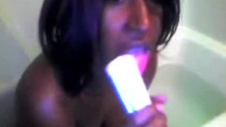 Beautiful black gf toying her pussy in the tub